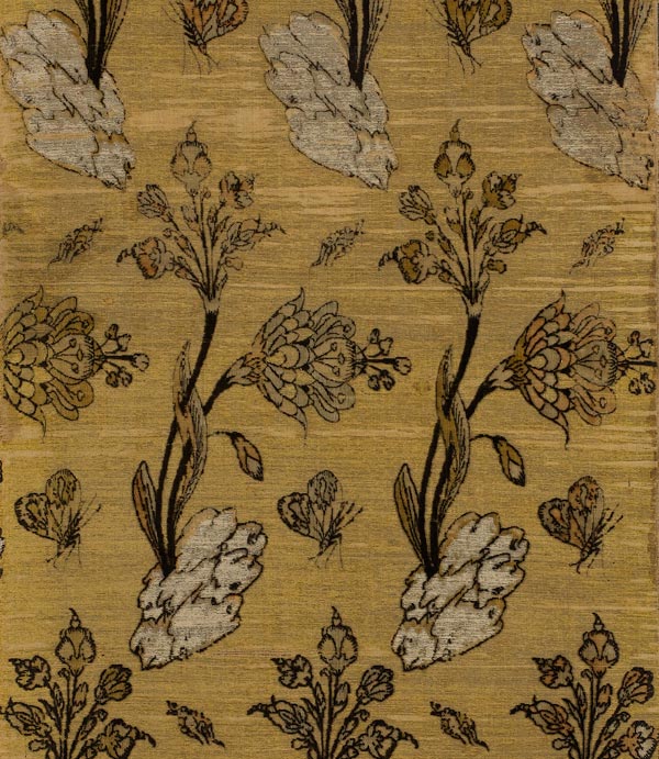 Detail of an Iranian textile panel showing blossoms and flies