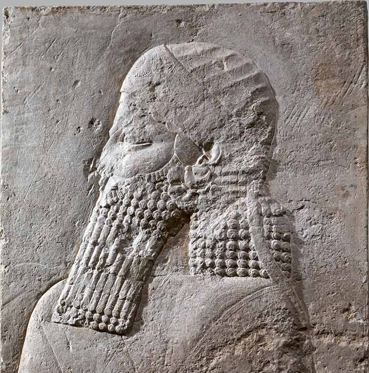 Relief sculpture showing Assyrian prince in profile view