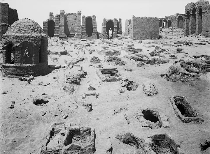Black-and-white archival photograph of 79 pit graves in Bagawat Necropolis