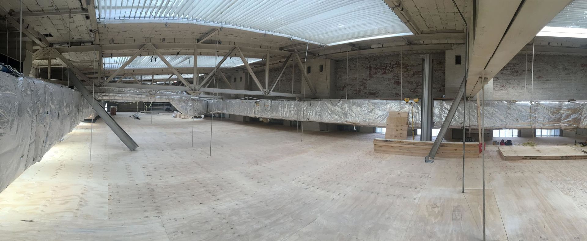 Panoramic image of attic space above The Met's European Paintings galleries under construction