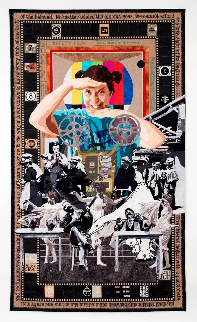 The author's finished silk-screened quilt, "Born Analog" (2014), features her likeness above a projector and a scene of several black-and-white figures at leisure.