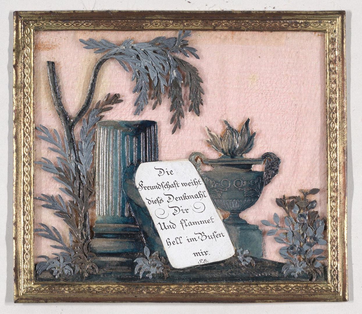 Collaged greeting card of a landscape with silver tree, broken column, and tablet with a pink background in a gold frame.