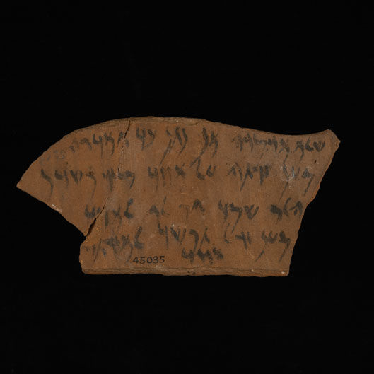 Ostracon with Aramaic inscription on both sides