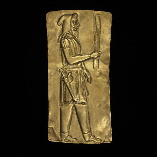 Votive plaque showing a priest
