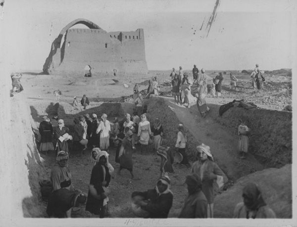 Workmen clearing a trench behind the Taq-i Kisra, Ctesiphon, Iraq