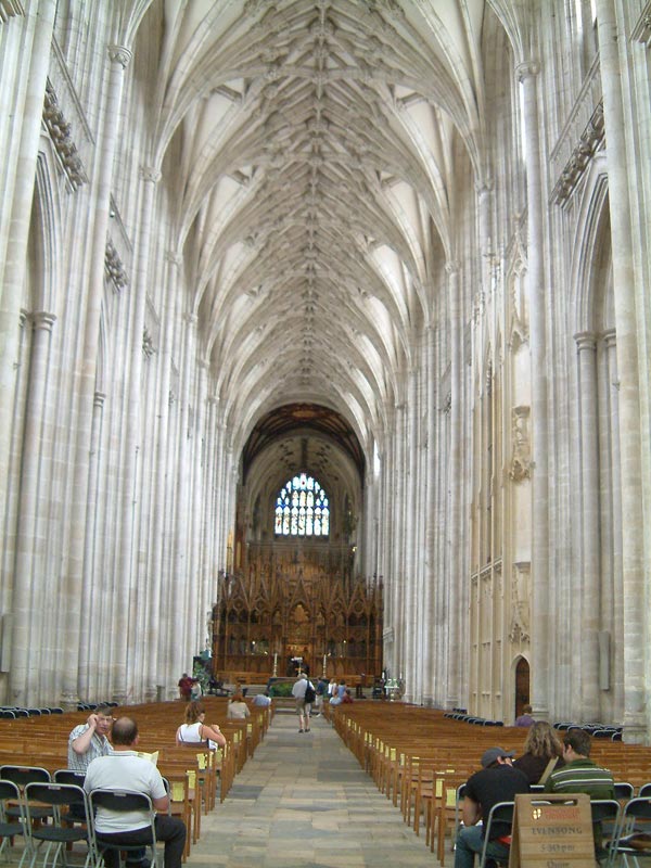 Interior of the nave with the wooden Gothic choir screen