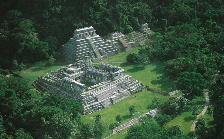 Photo of the Palenque site located deep within a verdant forest