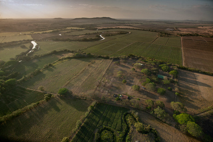 Photo of Sitio Conte site on a hazy sunny day