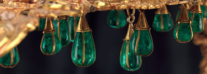 Detail view of a Columbian crown from the 17th century adorned with many emeralds