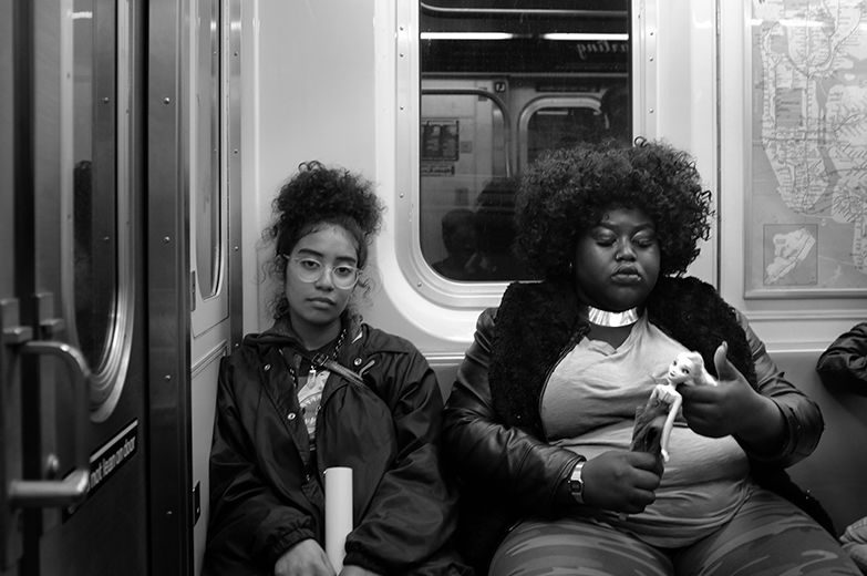 Women on Subway by Janet Lozano