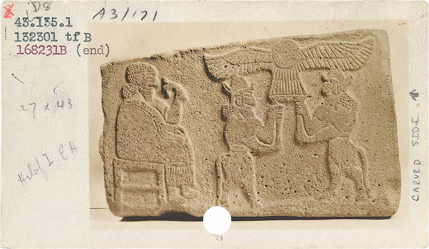 Archival catalogue card showing typewritten catalogue numbers at upper left and a photograph of one of the four Tell Halaf reliefs at The Met