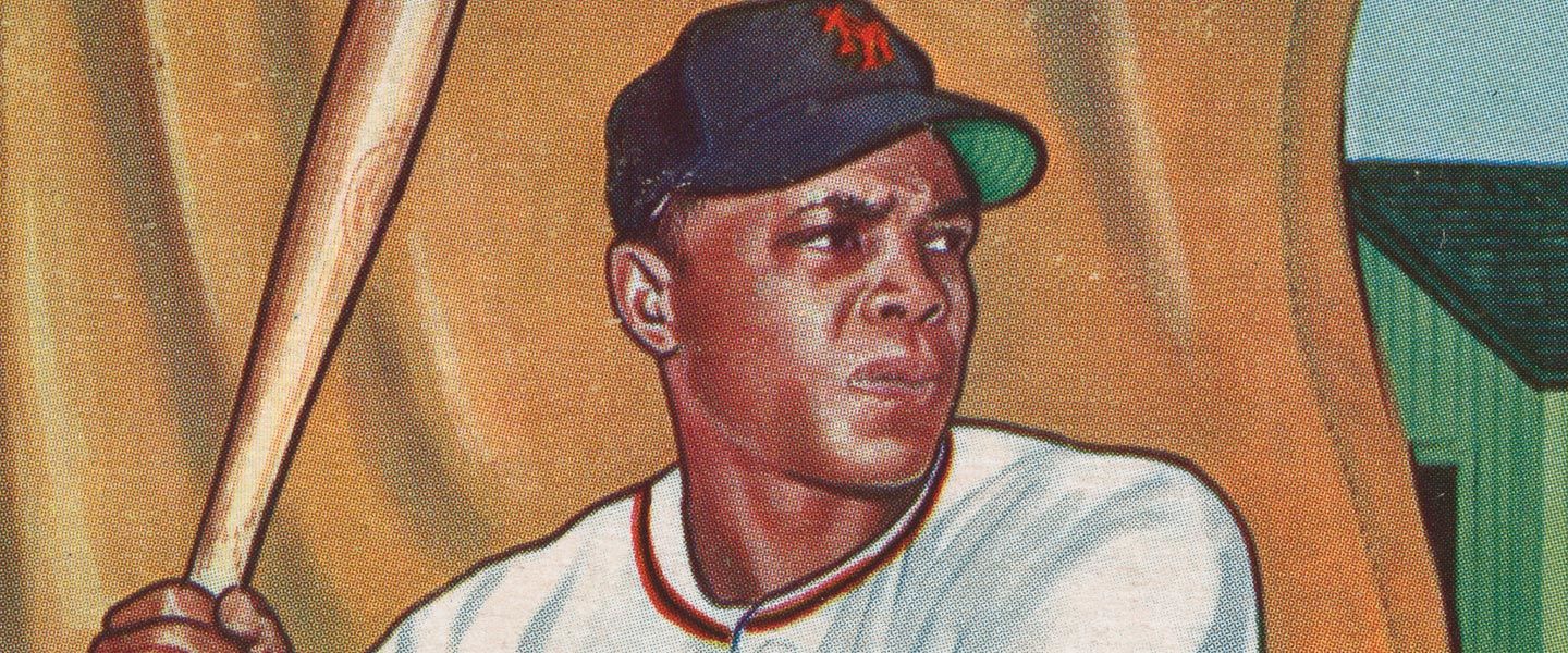 Detail view of a 1951 Willie Mays baseball card, showing Willie at bat in uniform