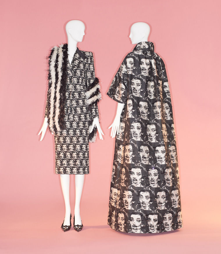 Two ensembles: at left, a blazer and pencil skirt with a shoulder throw; at right, a floor-length roomy coat
