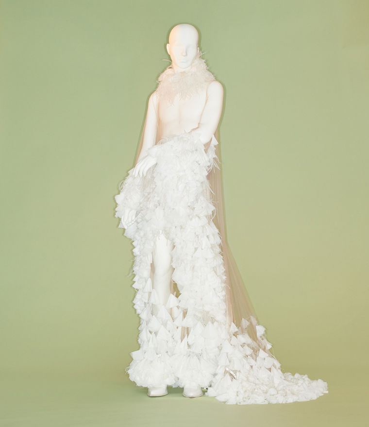 Couture wedding ensemble with gauzy train