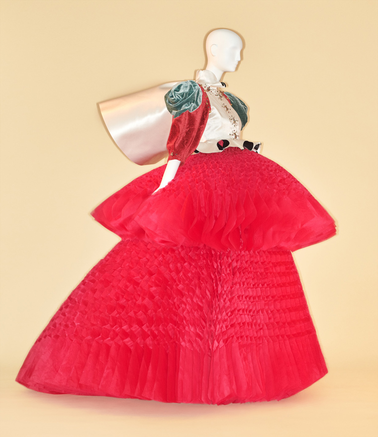 Couture ball gown made of bright, luxurious red fabrics