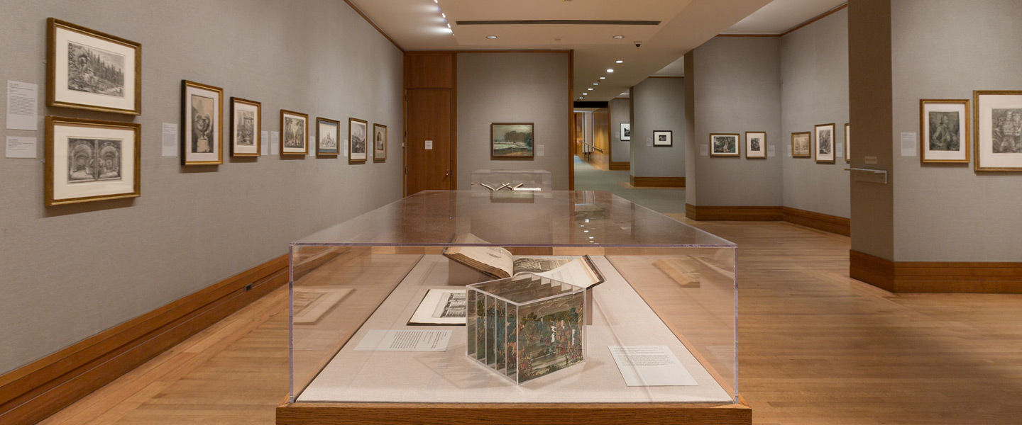 View of a gallery displaying an assortment of drawings and prints