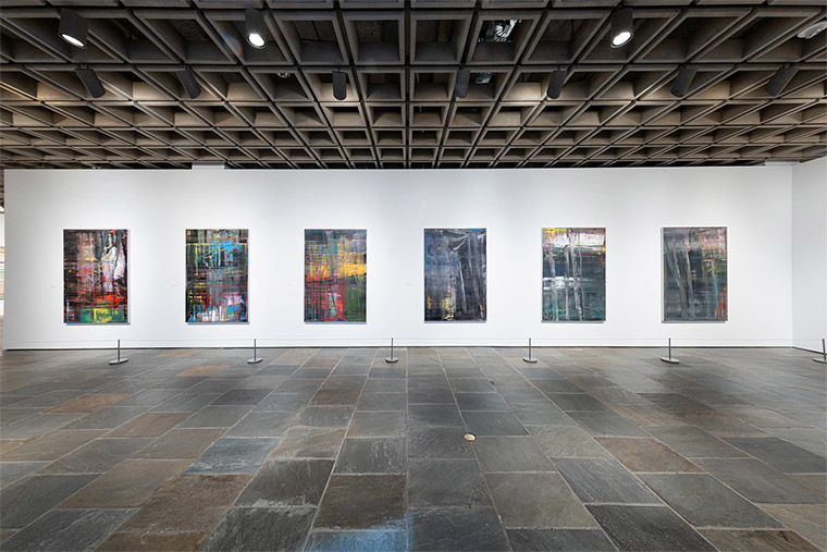 Installation view of Gerhard Richter: Painting After All at The Met Breuer featuring six paintings from the Forest (Wald) series