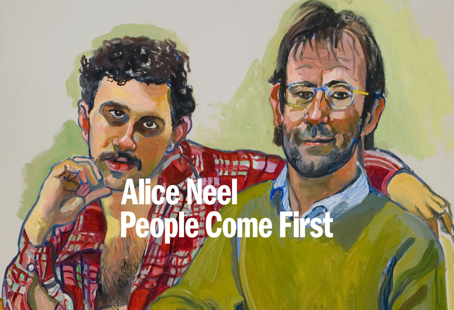 Portrait of two men: the one on the right dons a green sweater, a receding hairline, glasses, and stubble, while the other has an unbuttoned red plaid shirt, a mustache, his chin resting on his hand in a thoughtfol pose.