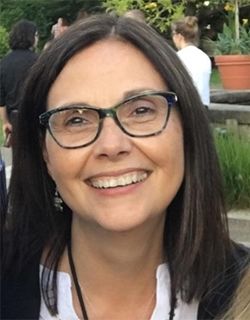 A portrait of a man in a suit