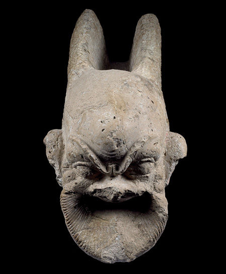 Water spout in the form of a theatrical mask