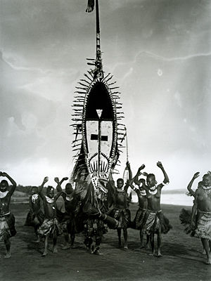 Women Dancing with <i>Hevehe</i> Masks along the Beach