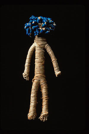 Doll with beaded hair
