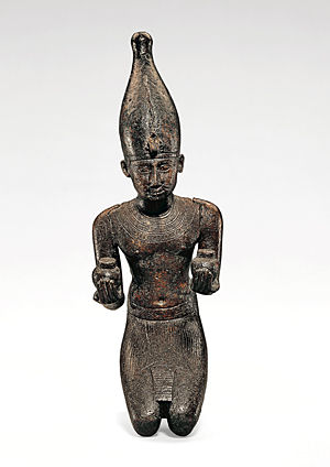           King Pami Kneeling and Offering <i>Nu</i>-Pots        