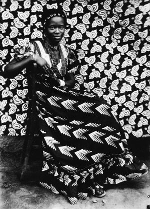 Untitled [Seated Woman with Chevron Print Dress]