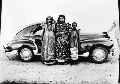 Untitled [Two Women and a Girl in front of a Peugeot]