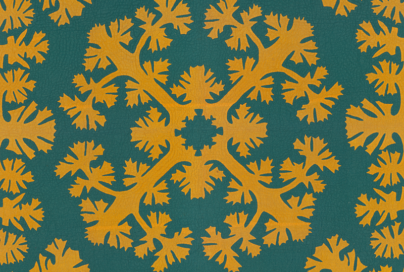 A yellow and deep green Hawaiian Quilt featuring a Lei Mamo pattern.