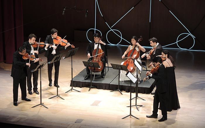 A string sextest performs on the Grace Rainey Rogers Auditorium stage