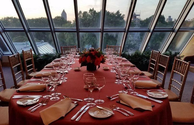 The Rose Room Metropolitan Museum Of Art An Intimate And Elegant Glass Enclosed Room A Dining Table Covered In