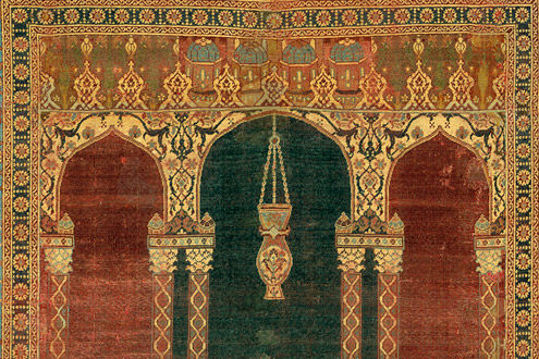 Prayer carpet with triple-arch design