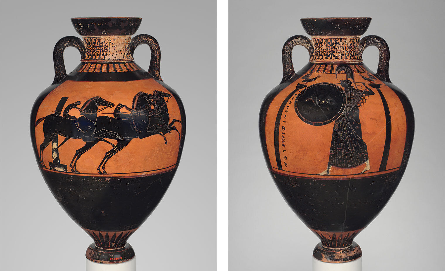 A terracotta vase depicting a chariot race on one side and the goddess Athena on the other