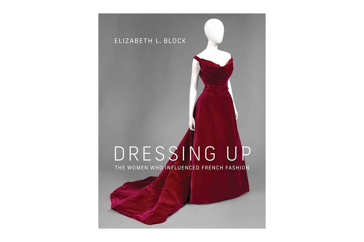 A book cover depicting a mannequin in a red dress