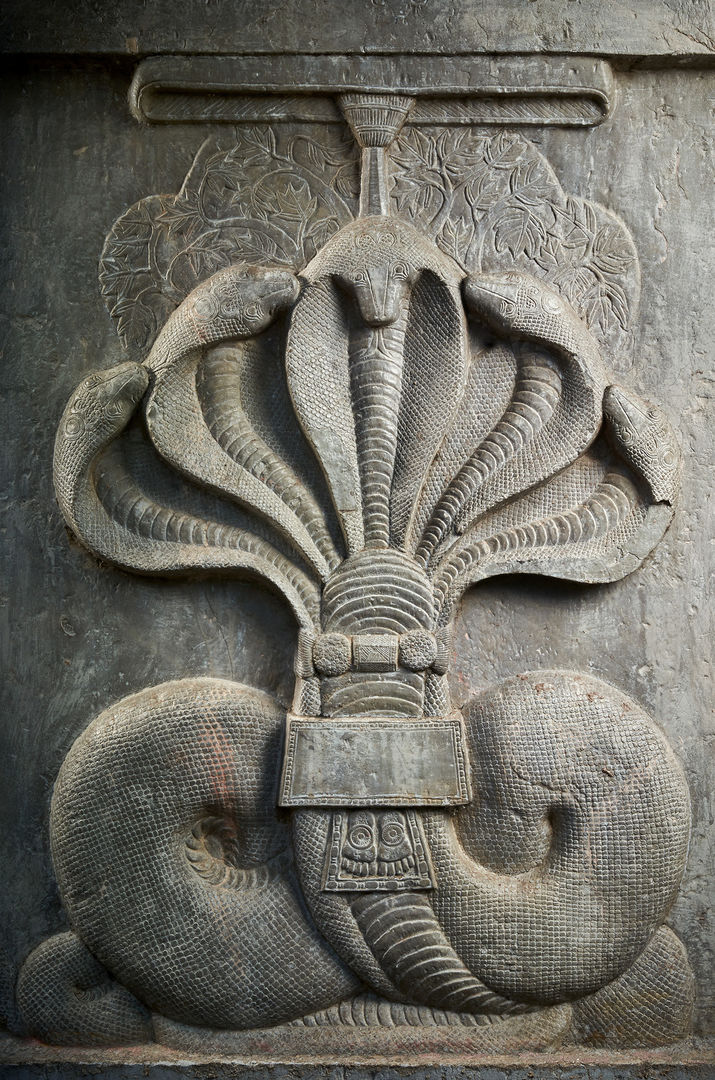 Limestone carving of five cobra heads