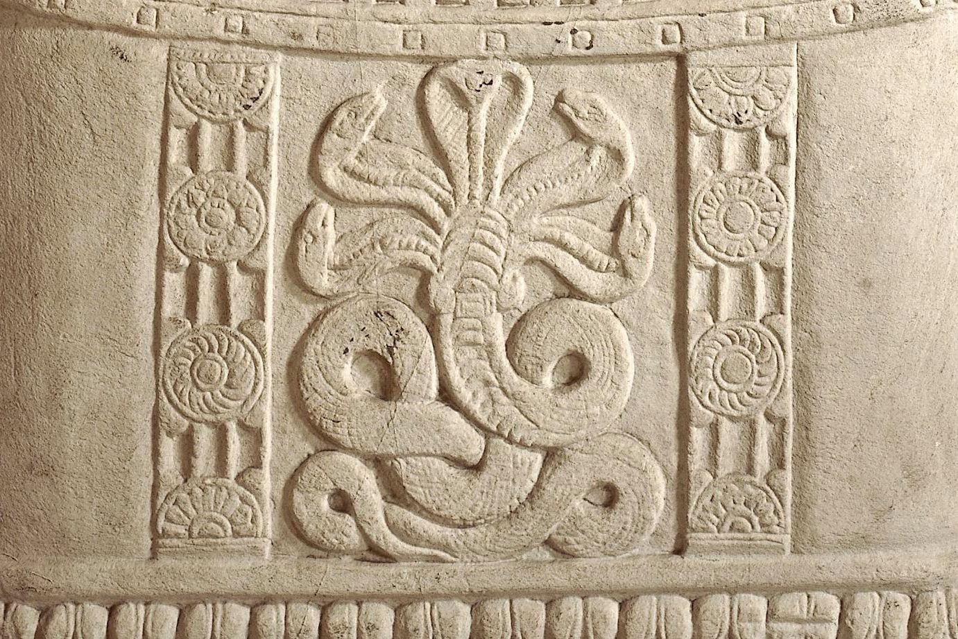 Limestone carving of five serpent heads