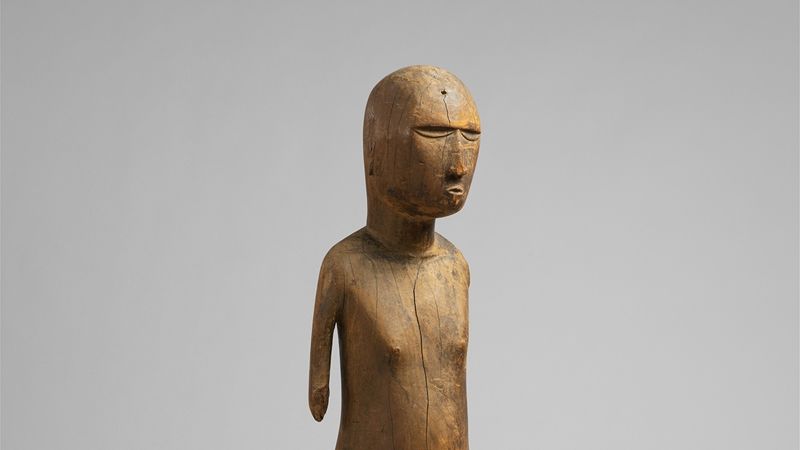 Wood sculpture of a male figure or tiki