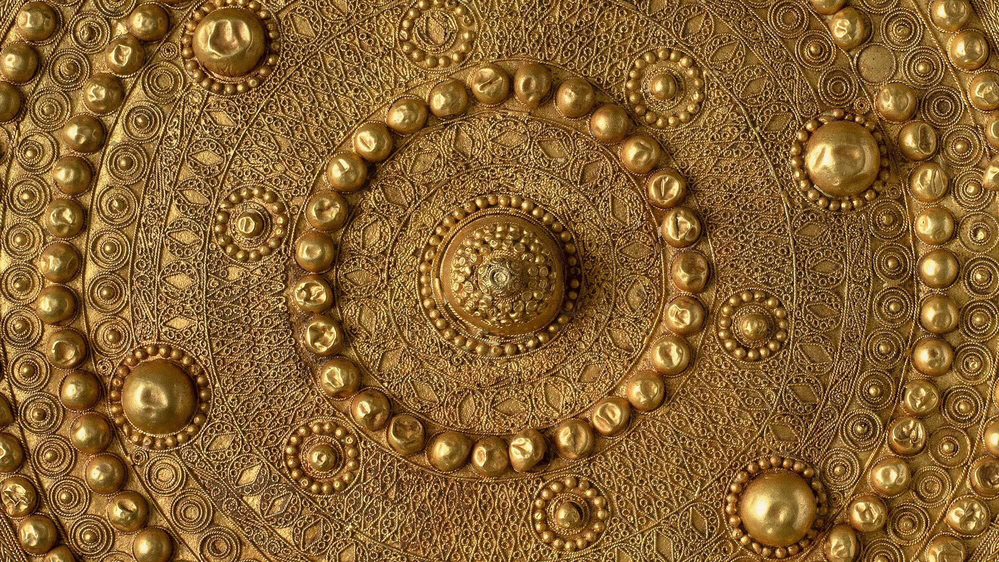 An ornate gold pectoral