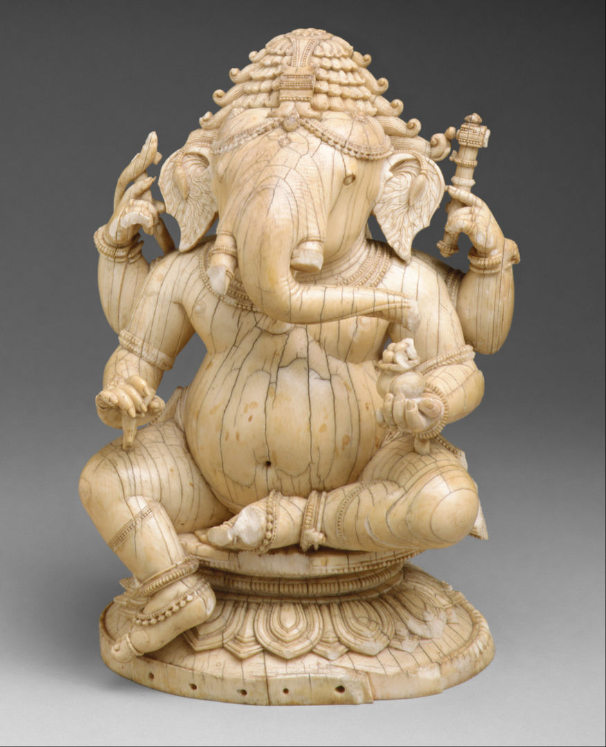 Ivory sculpture of a seated Ganesha