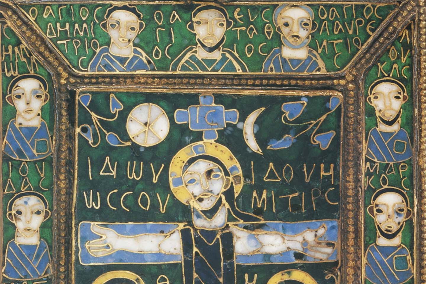 Green and blue Byzantine enamel object with Jesus on the cross surrounded by the apostles