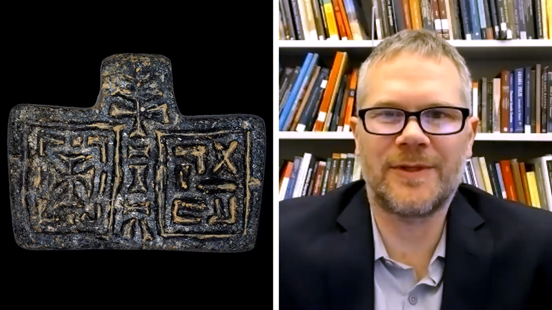 Artwork piece with carved symbols, and a screen grab of speaker Michael J. Harrower