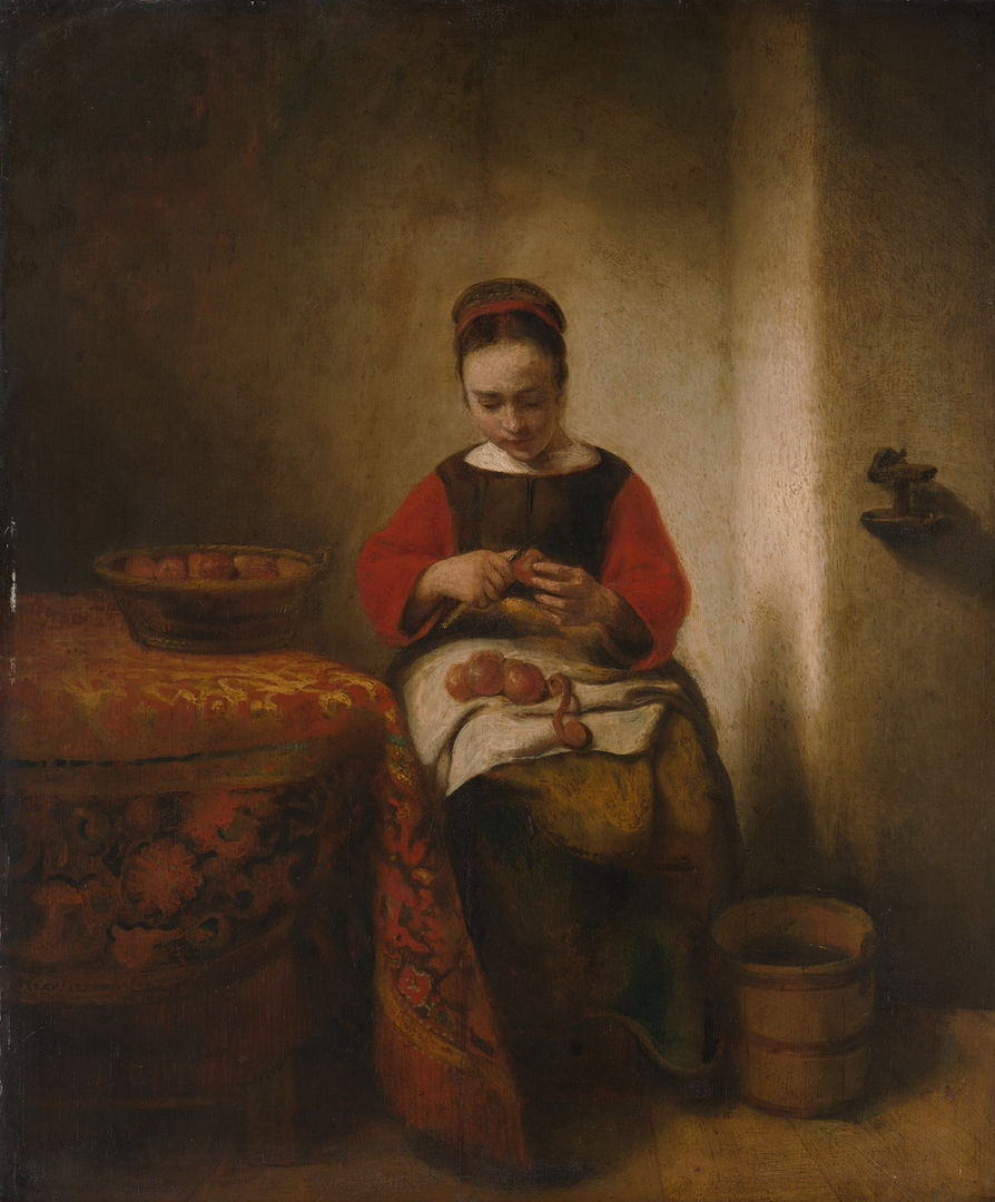 A young woman wearing servants’ clothing sits by a table peeling a basket of apples, illuminated by soft light.