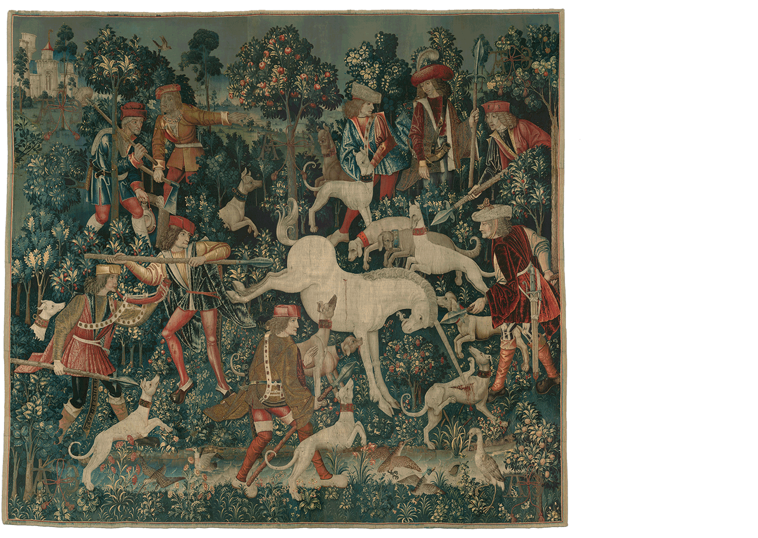 In this tapestry, the unicorn bucks and stabs one of the hounds with its horn, opening a large red wound. More hunters and dogs surround the animal, suggesting the hunt is reaching its climax.