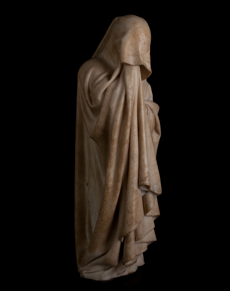 Statuette of a monk covered with a cape from head to toe