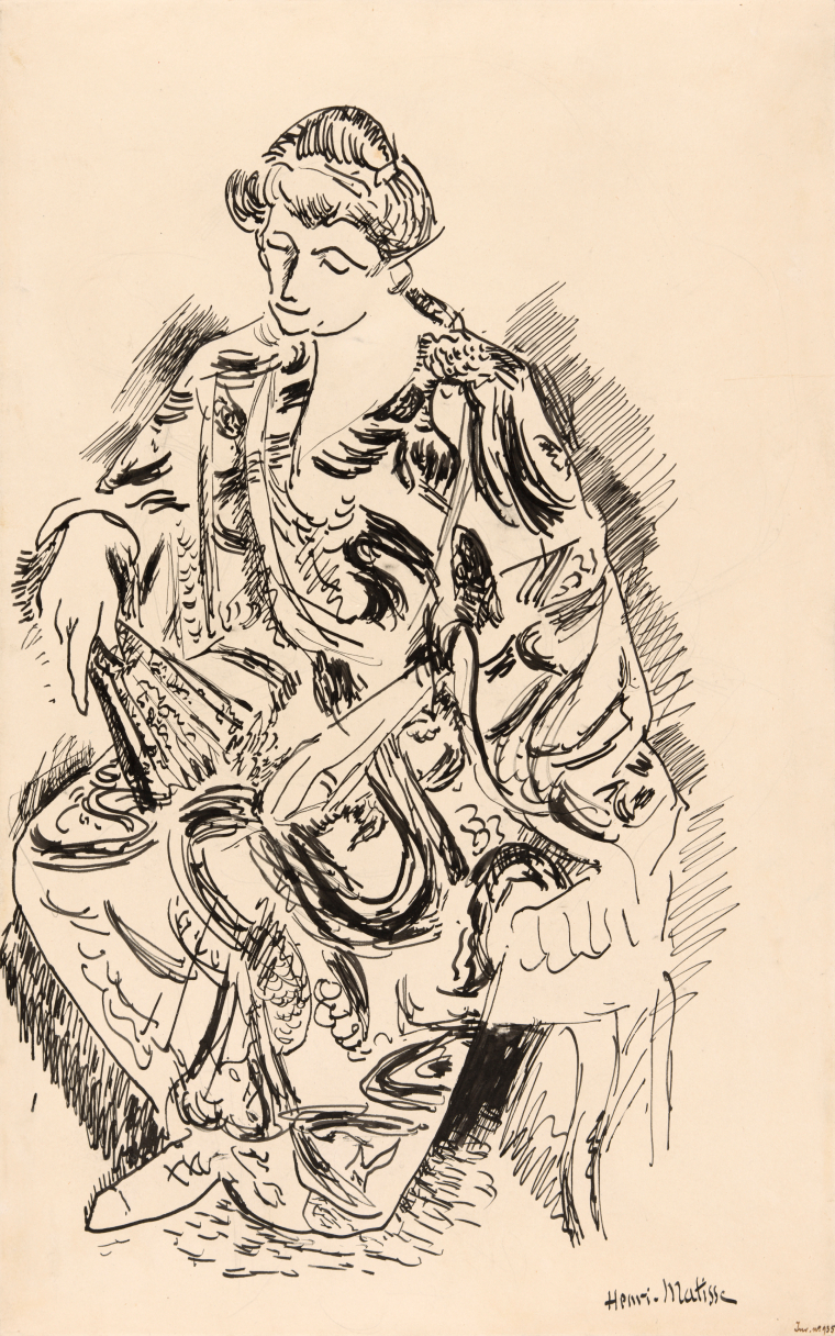 woman seated on a chair holding a fan