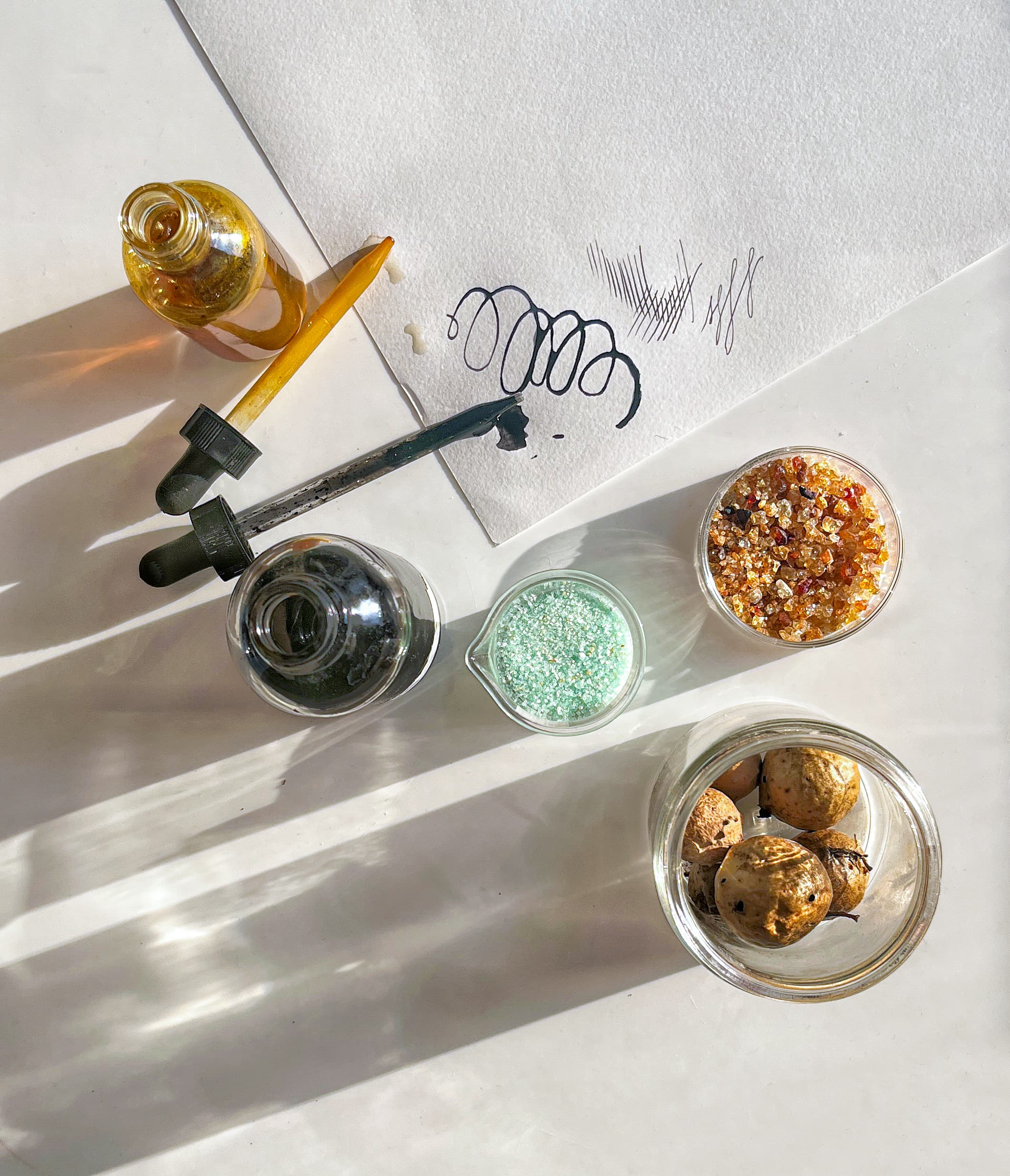 Bottles and jars with materials for making iron gall ink