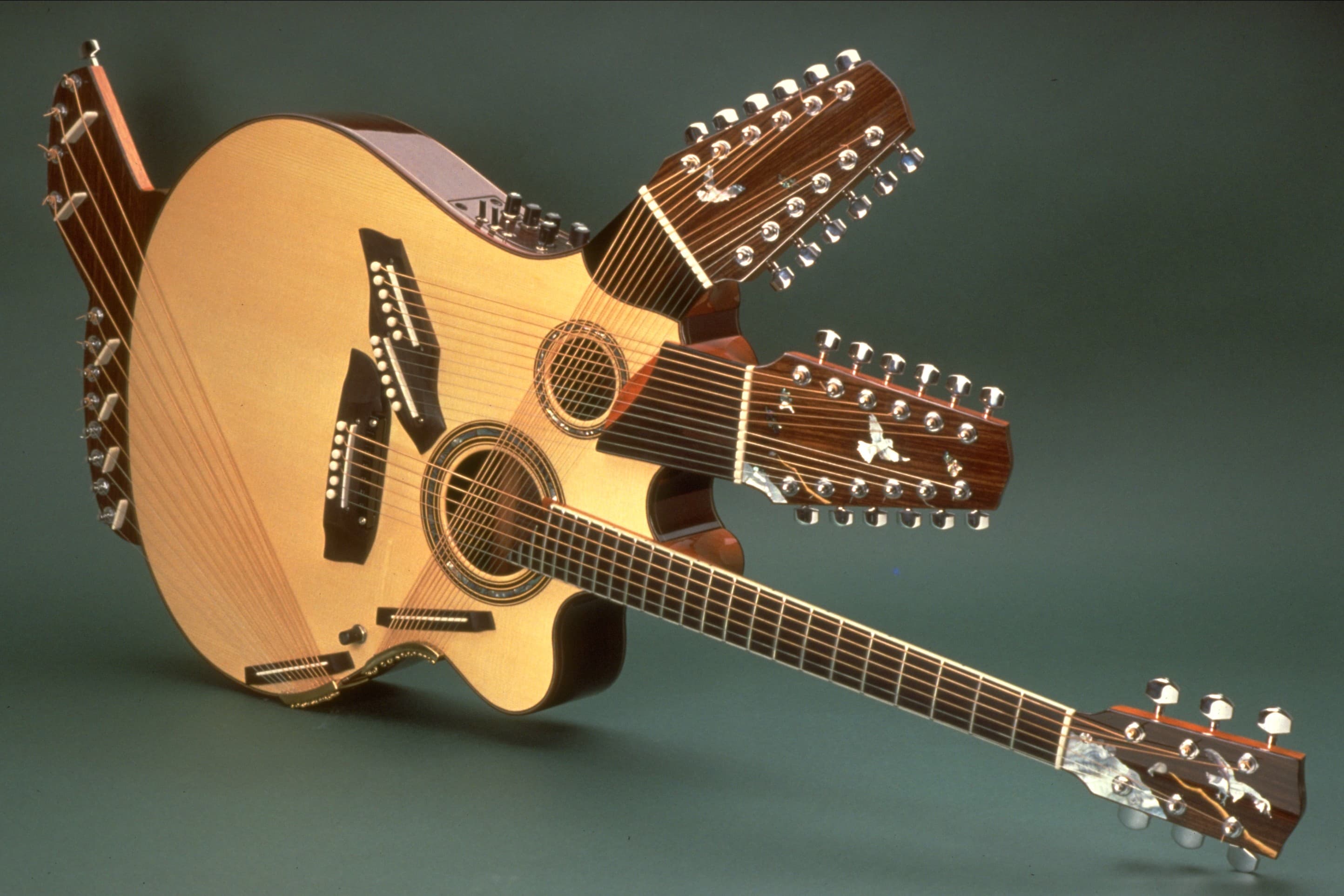 Image of custom designed guitar designed with three necks.