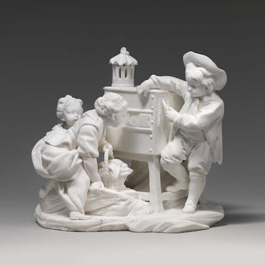 Porcelain figurine showing children playing