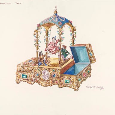 An elaborately decorated gold music box, with inlaid stones, featuring figurines of children playing on a swing
